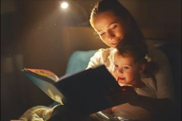 mom reading to a child